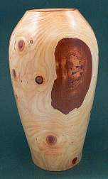 Image of an Cypress hollow vessel made by Chris Rymer of Inside Out Wood Art