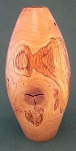 Image of an Oak hollow vessel made by Chris Rymer of Inside Out Wood Art